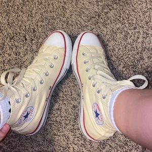 pastel yellow high top converse